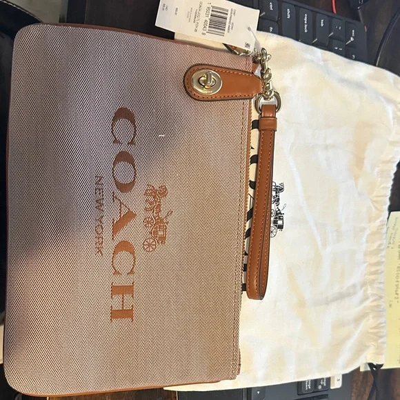 Coach Pink and Tan Wristlet - Picture 1 of 9